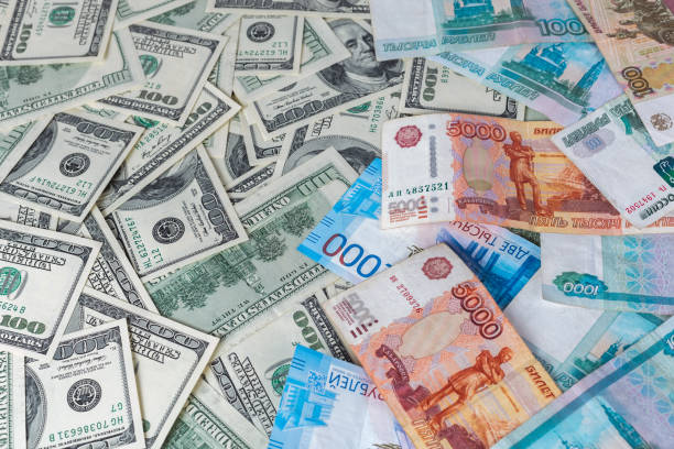 istock russian rubl and us dollar banknotes close-up with selective focus 1187688948