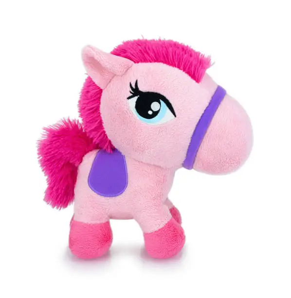 Cute pink horse plushie doll isolated on white background with shadow reflection. Playful bright pink pony on white underlay. Teddy horse plush stuffed puppet on white backdrop. Pinky soft toy.