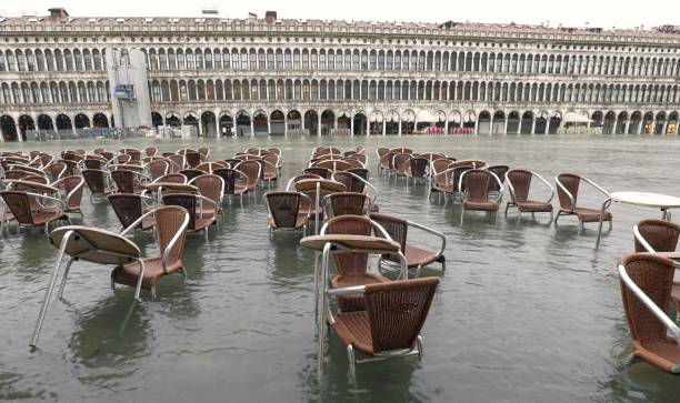 Tables and Chairs in Saint Mark Square in Venice in Italy during