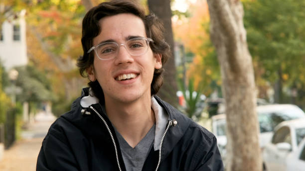 istock Smiling young man looking at the camera 1187692543