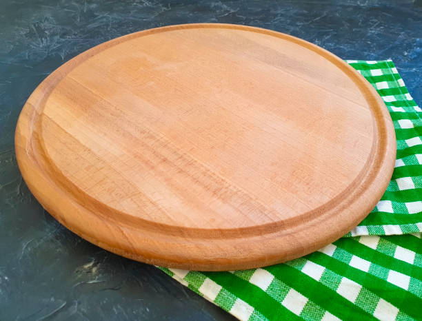 istock round wooden board, towel 1187693252