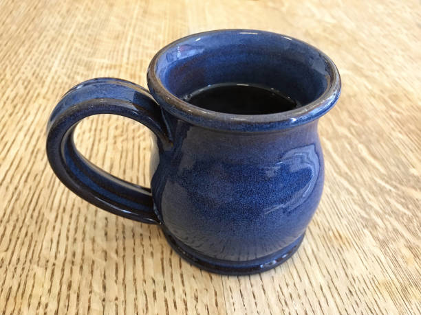 istock Cup of coffee in a diner table 1187698058