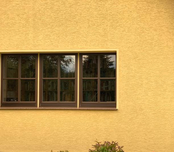 istock Yellow house wall and window 1187698206