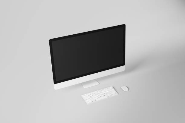 istock Blank black modern monitor of white computer at abstract light background. 1187698439