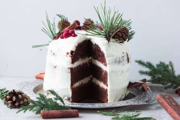 istock Christmas Winter baking cake concept. Winter cake with cones. 1187701557