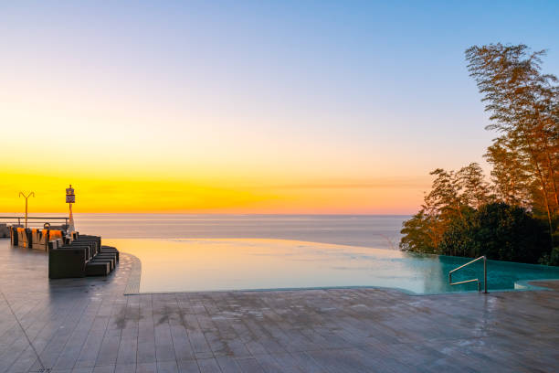 istock Infinity Edge Swimming Pool Water, Beautiful Black Sea View at sunset. 1187701639