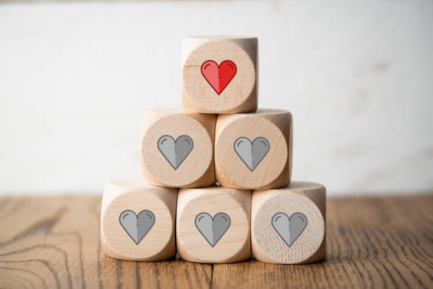 istock wooden blocks with heart icons 1187701792