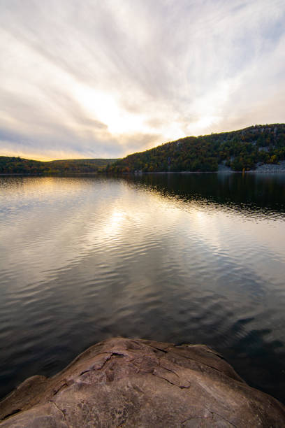 istock Sunset on the water at Devils Lake state park, WI. 1187702857