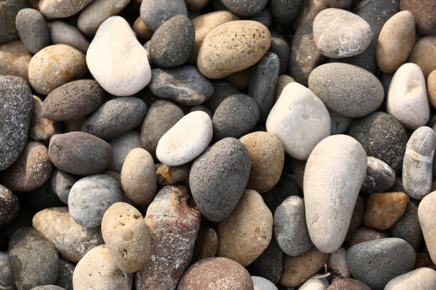 istock Abstract smooth round pebbles sea texture background 1187703226