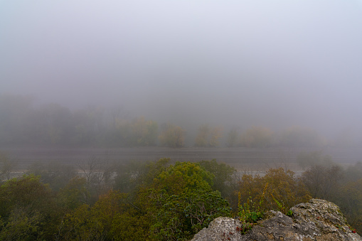 heavy fog on a fall morning at the Mississippi Palisades national natural landmark.