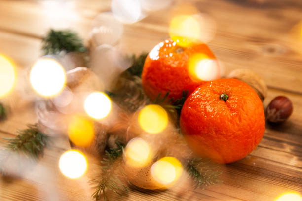 istock Mandarins on a wooden background 1187710209