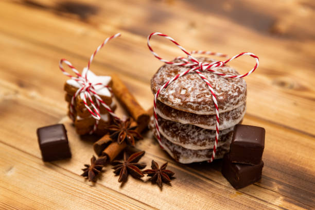 istock Gingerbread with a bow on a wooden background. 1187710280