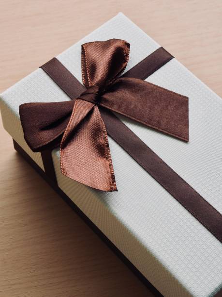 istock Brown ribbon and gift box 1187729862