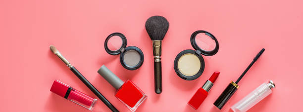 istock Make up items on pink color background. Horizontal web banner. Set of luxury decorative cosmetics flat lay, top view, mockup, template. Minimal style. Beauty blogger concept 1187729971