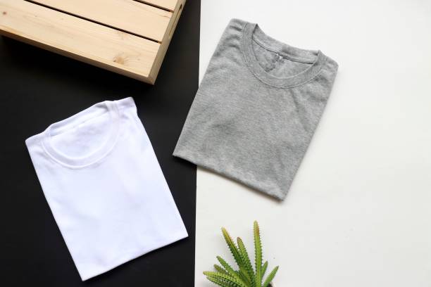 istock black , gray , white t-shirts with wood box and cactus. rustic background 1187739389