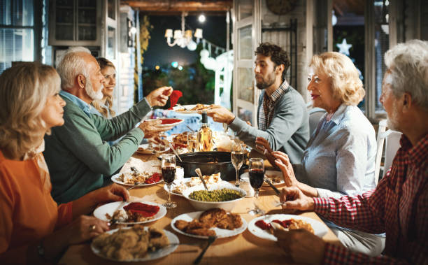 Family having Thanksgiving dinner.