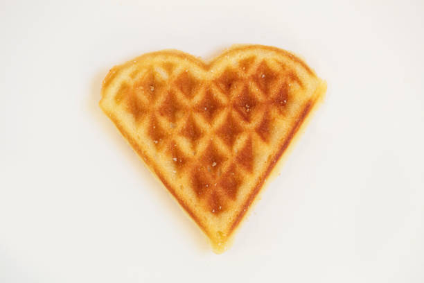 istock Heart shaped cookies. Viennese waffles on a white background 1187757428