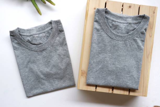 istock black , gray , white t-shirts with wood box and cactus. rustic background 1187758615