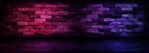 istock Studio dark room with lighting effect red and blue on brick wall gradient background for interior decoration. 1187764190