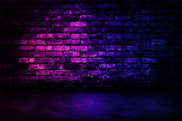 istock Studio dark room with lighting effect red and blue on brick wall gradient background for interior decoration. 1187764198