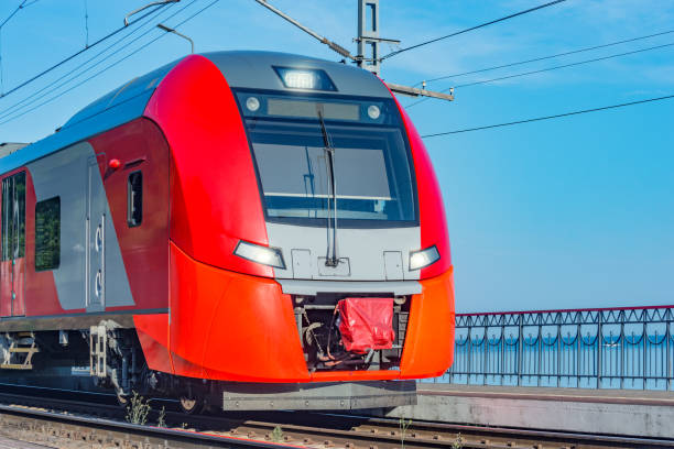 istock Passenger train stands along the platform by the Black sea coast. Sochi. 1187768865