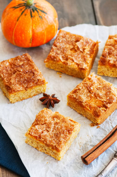 istock Pumpkin cornmeal bars on a wooden background. 1187770110