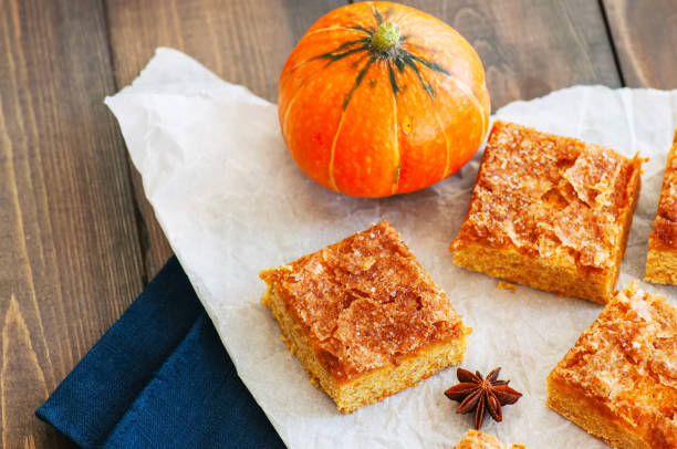 istock Pumpkin cornmeal bars on a wooden background. 1187770114