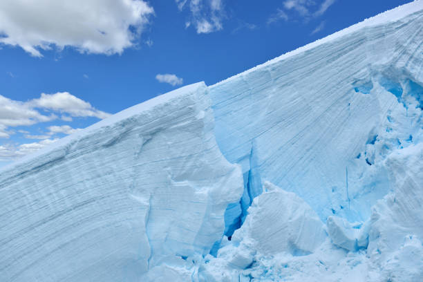 close-up of glacier cross section reflection blue sky, antarctica - climate change south pole antarctica imagens e fotografias de stock