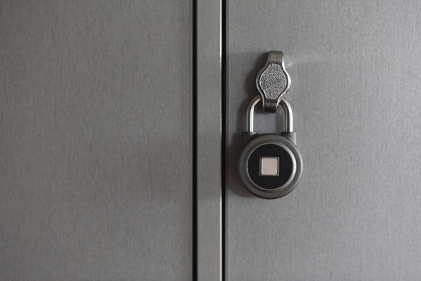 fingerprint padlock is locked and hanging on cell fingerprint padlock is locked and hanging on cell of storage locker in hostel wooden flash drive stock pictures, royalty-free photos & images