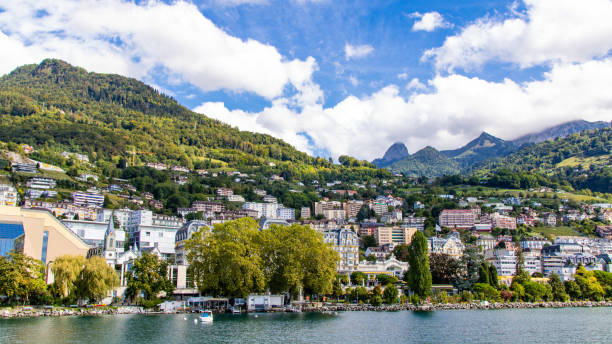 Montreux, the Swiss Rivera View from Lake Geneva on the town of Montreux and the mountains overlooking it. montreux photos stock pictures, royalty-free photos & images