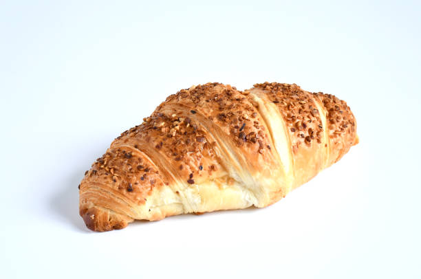 Close up fresh  croissant on white background, croissant is a buttery, flaky, viennoiserie pastry of Austrian origin, delicious idea for breakfast, stock photo