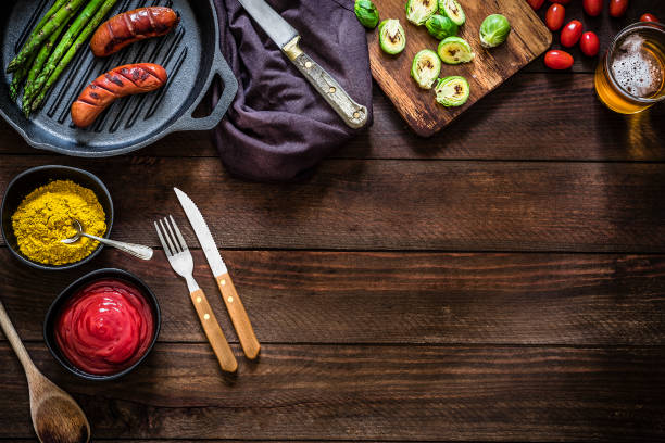 Grilled German sausages with curry and ketchup sauce