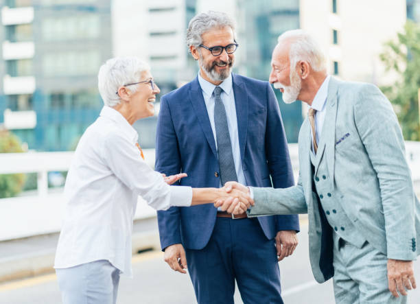istock Business people shaking hands 1187785582