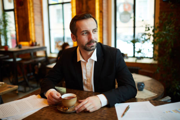 istock Businessman in Cafe 1187787684