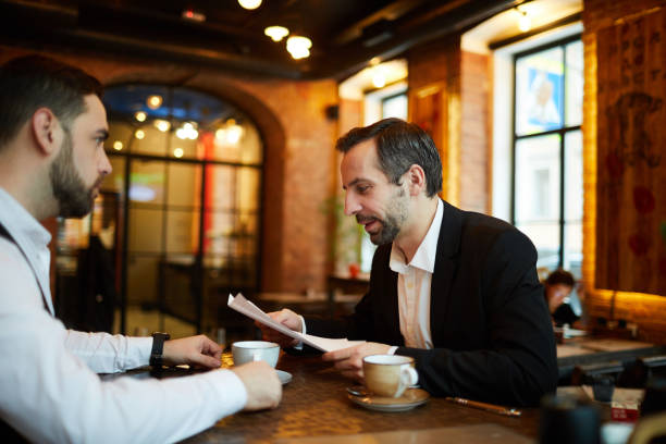 istock Business people Meeting in Cafe 1187787688