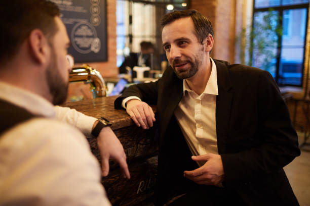 istock Business People Relaxing in Bar 1187787716