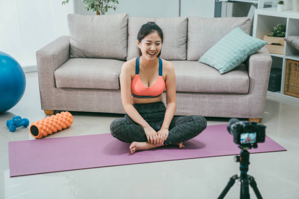 istock Female vlogger recording sports related broadcast 1187791449