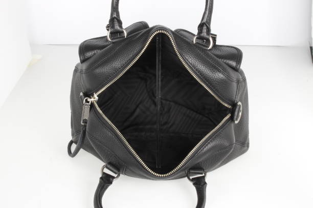 istock Elegant black bag for official use with mini black pouch for makeup and other essentials with white background 1187792706