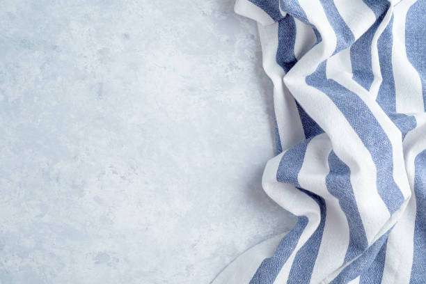 istock kitchen cloth napkin on wood background with copy space 1187793632
