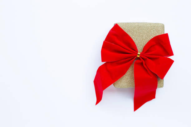 istock Gift box  on white wooden background. 1187795658