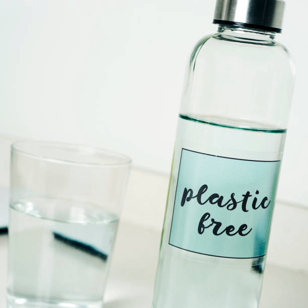 istock reusable water bottle with the text plastic free 1187797108