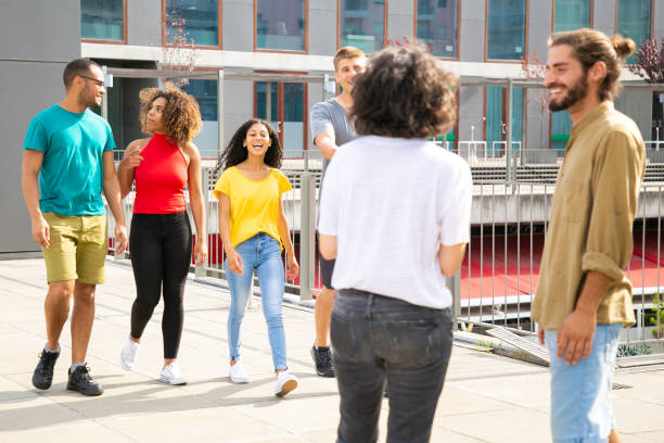 istock Happy friends walking outdoors 1187799364