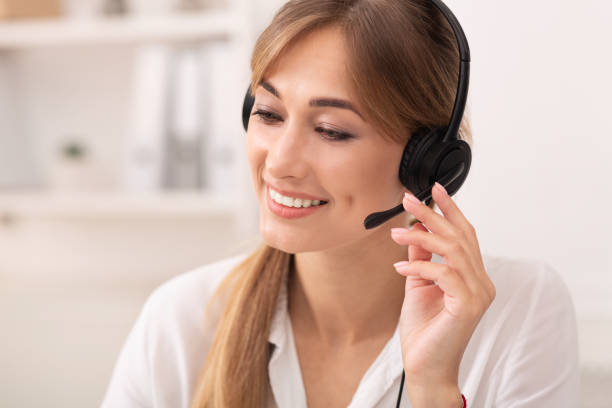 istock Call Center Worker In Headset Receiving Client's Feedback Sitting Indoor 1187799656