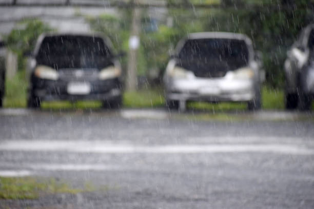 istock Rain with the car parked in the background 1187799970