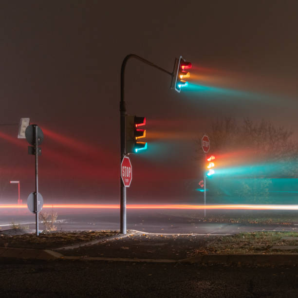 istock traffic lights in a foggy night 1187802942