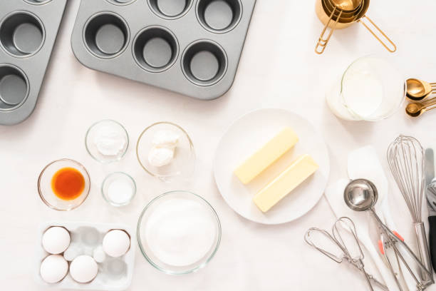 istock Mixing batter to bake home made vanilla cupcakes 1187806165