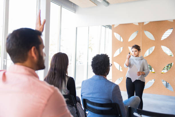 istock Business trainer answering audience question 1187806281