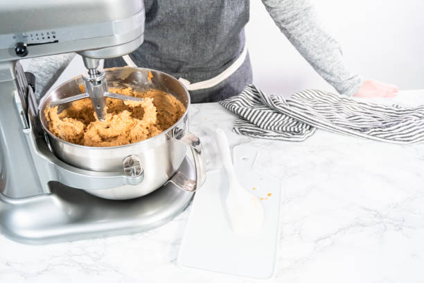 istock Mixing ingredients to bake peanut butter cookies. 1187806717