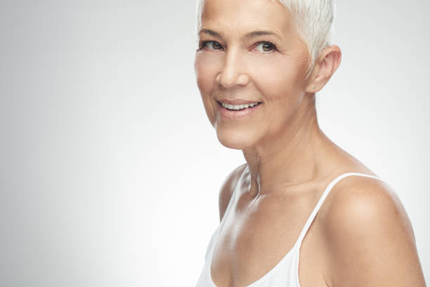 istock Senior woman posing in studio. 1187808163