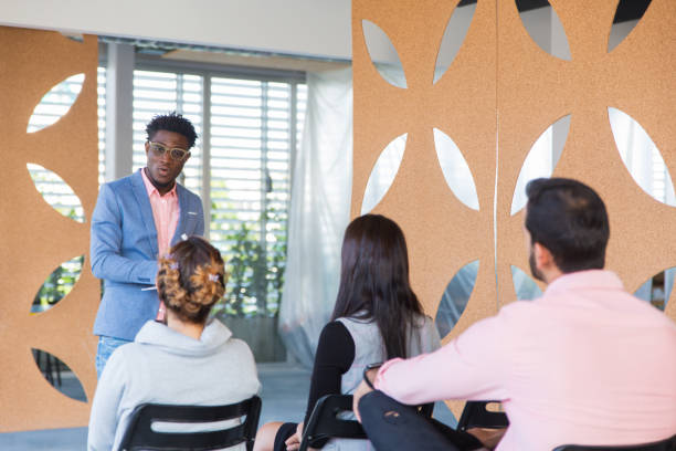 istock Popular trendy business coach giving lecture 1187809308